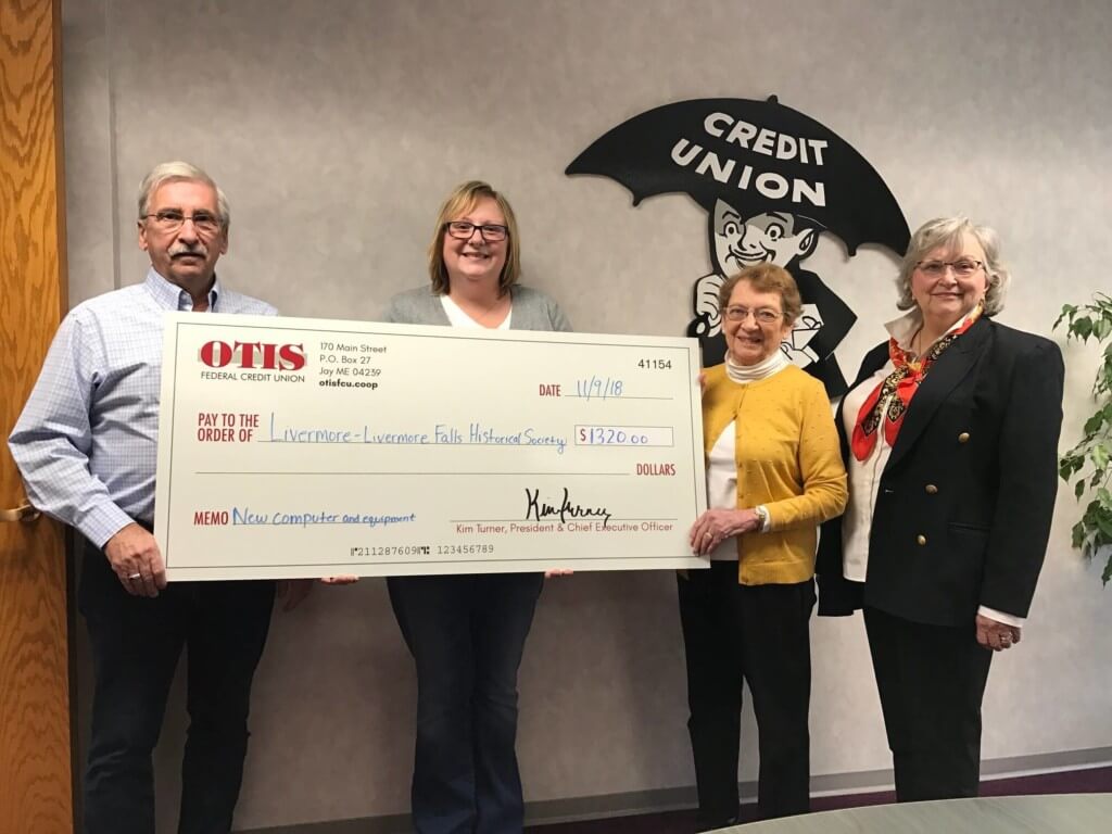 Pictured in photo, L to R: Gary Desjardins, Director, OTIS FCU Board of Directors and member of the Livermore-Livermore Falls Historical Society; Kim Turner, President/CEO, OTIS FCU; Muriel Bowerman, President, Livermore-Livermore Falls Historical Society; Ghislaine Bérubé-Hughes, member of the Livermore-Livermore Falls Historical Society.