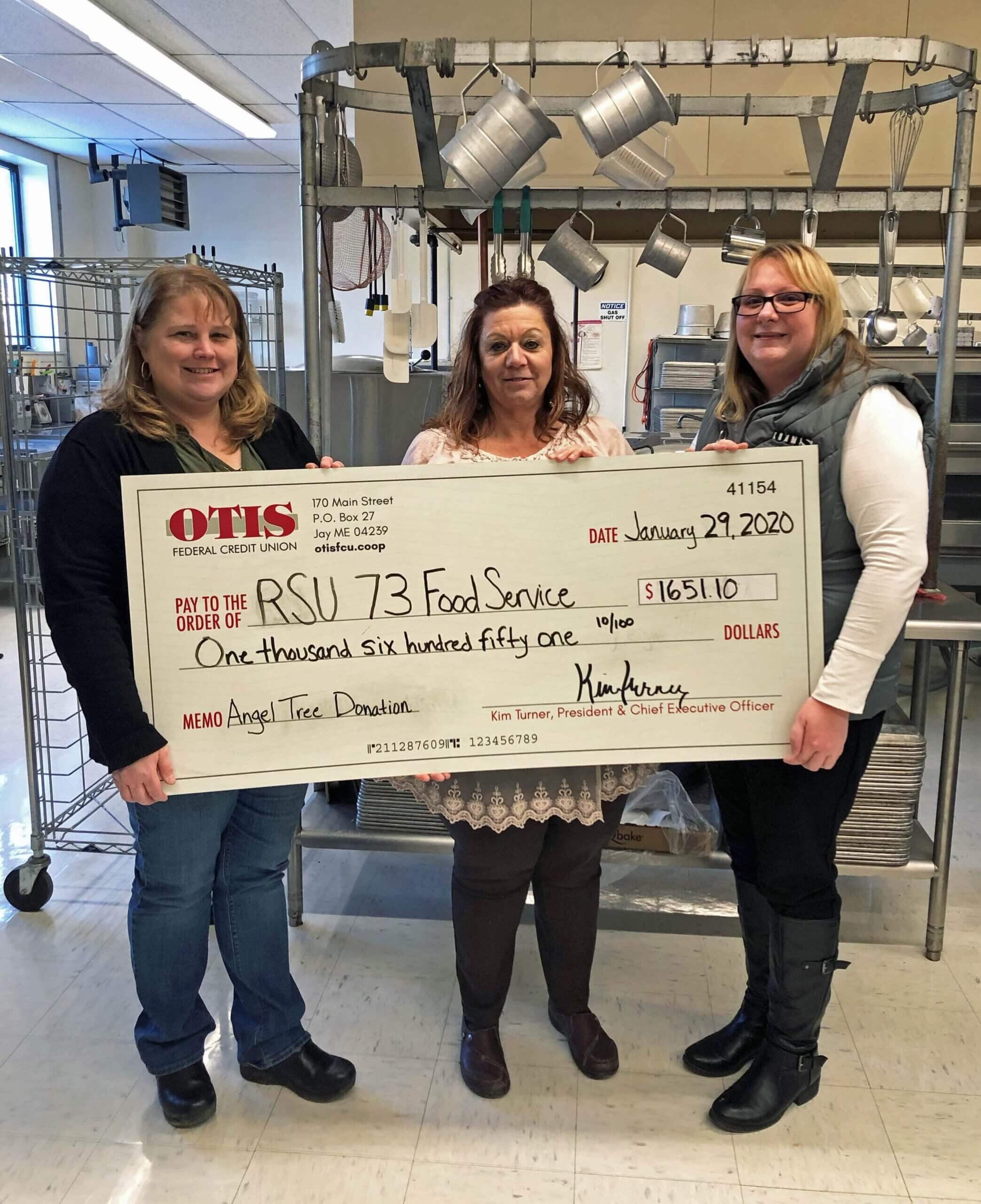 Kim Turner, our President/CEO, and Diane Sonos, our Receptionist, and RSU 73 Food Service Director Laura Lorette