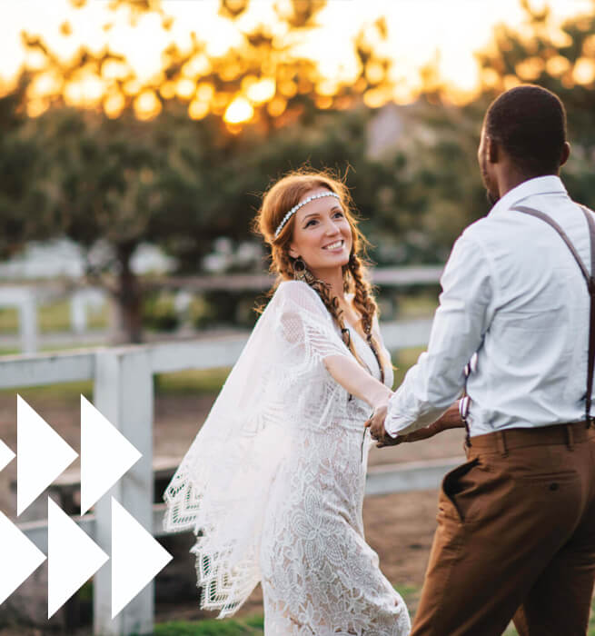 well-dressed woman and man outside