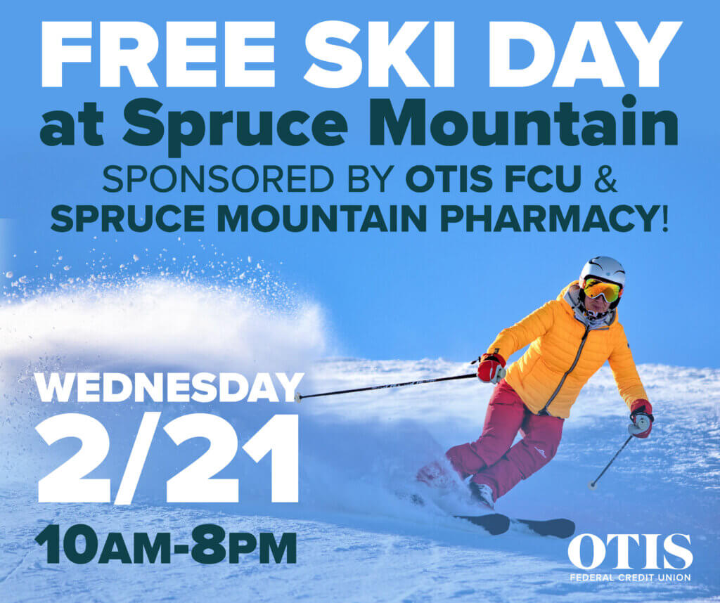 Skier in yellow jacket and red pants. Free Ski Day at Spruce Mountain on February 21.